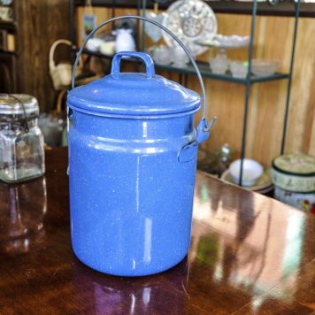 Blue enamelware round water pail